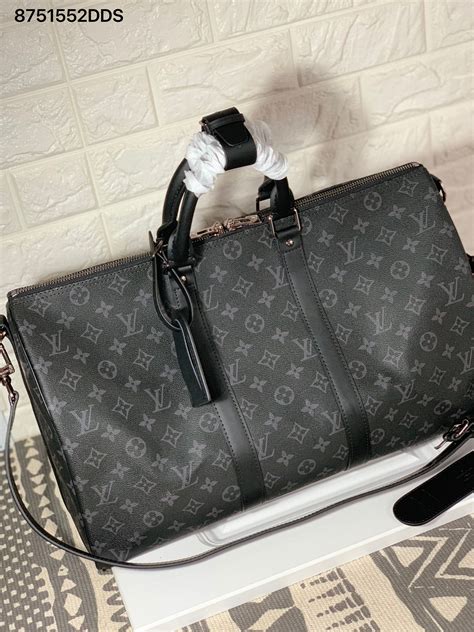 louis duffle bag black|louis vuitton duffle bag suitcase.